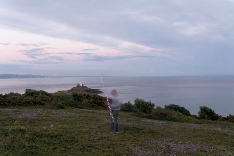 The artist on Mumbles Hill, Wales with a malfunctioning light painter 
